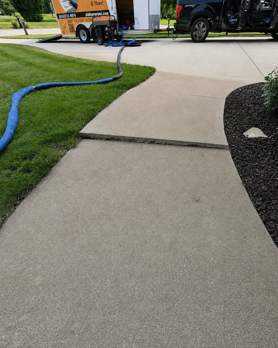 Uneven Sidewalk before leveling